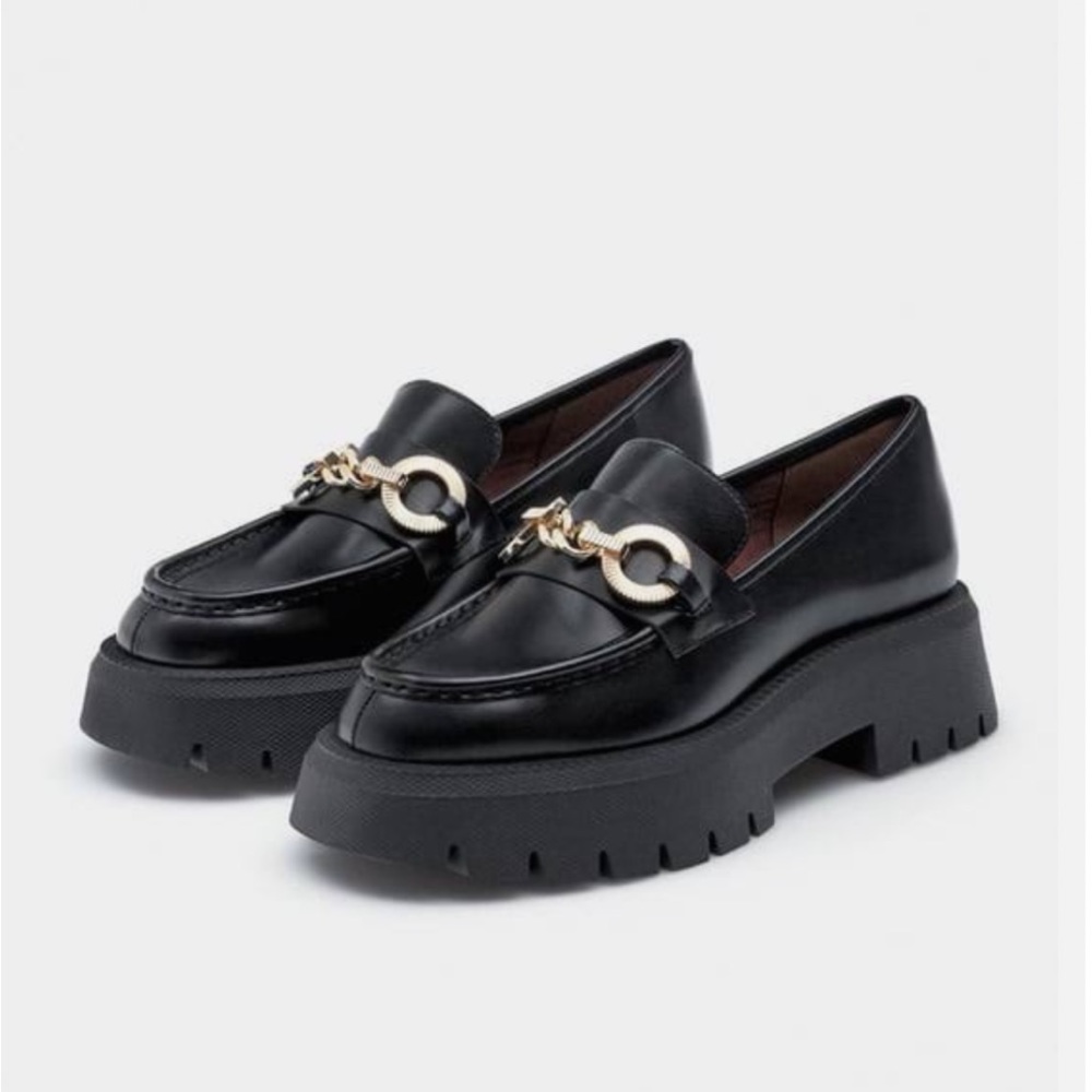 Black platform loafers
